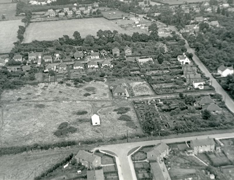  Jack Botham aerial photograph 631. Windsor Road (later Oakwood Avenue) across bottom, East Road on the right. Norfolk Avenue and Suffolk Avenue. 
Cat1 Aerial Views-->Mersea