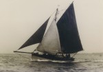 Smack MARY racing in a Regatta, around 1949. Bill Baker at the helm. 
Known locally as 'big' MARY. c1949.