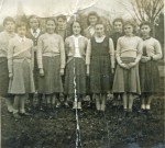 8. ID KBA_PPL_025 Girls at Birch School 1953-54. Photograph taken on the round lawn in the school garden - you can see the church spire in the background top left.
L-R Mavis ...
Cat1 Birch-->School