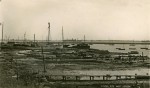 A distant view of the PHILOCTETES laid up in the River Blackwater c1947. She is the left-most of the two vessels in the river. The ketch BLACK FOX can be seen on the edge of the houseboats.