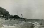 263. ID RG11_271 The Beach, West Mersea. Kingsland Beach with the windpump at Shears Meadow boating lake in the distance. Postcard mailed 6 May 1948.
Cat1 Mersea-->Beach