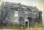 208. ID SS050031 The house of Charles Harvey, Great Wigborough after 1884 earthquake. The people by the front door do not seem concerned that someone is working on the roof ...
Cat1 Places-->Wigborough Cat2 Disasters and Mishaps-->on Land