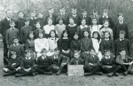  Birch C. of E. School 1920. Group I.
 Back row L-R 1. John Gill, Headmaster, 2. Basil Rootkin, 3. Bill Partner, 4. PA Ted Wheeler, 5. Vick Mattock, 6. Ellit Everitt, 7., 8. PA Cyril Bambridge, 9. Ted Bambridge, 10. PA Humphrey, 11. George Tosbell [born 1906]
 Second from back 1. Roy French, 2. Gushy Everit, 3. Hilda Freeman, 4. PA Bessie Horn, 5. Joyce Daly, 6. Annie French, 7. Connie Hartington, 8. PA Kate Williams, 9. Nellie Whybrow, 10. PA Lesley Bond.
 Third 1. PA Bert Smith, 2. Elsie Brazier, 3. Ethel Burmby, 4. Connie Bullock, 5. Olive Taylor, 6. Hilda Fletcher, 7. Gracie Fisher, 8. Hylda Reeve, 9., 10 Harold Smith.
 Front row 1., 2. Basil Partner, 3. Fred Roberts, 4. Bert Roberts, 5. Diffin Andrews, 6. Billy Bell, 7., 8 Smith.  ELB_SCH_101