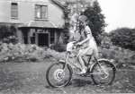 8. ID PMS_COR_001 Pauline Winch with her red, white and blue bicycle, decorated for the 1953 Coronation. In the grounds of Bracken in Empress Avenue, now No. 31.
Cat1 Mersea-->Events