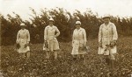 86. ID JAY_SDG_007 Mersea Seed Growers during WW1. Land Army in First World War. 
Mrs Goldy Green, Beatie Green, Mrs Watcham, Mabel Benns. [Names from back of card.]
Cat1 Farming Cat2 War-->World War 1 Cat3 War-->World War 1