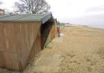 171. ID MLD_ESP_023 Early spring and the beach is quiet. Traditional beach huts, by the bottom of Fairhaven Avenue.
Cat1 Mersea-->Beach