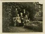  Reverend Frederick Yates and family in the grounds at Great Wigborough Rectory. Small photograph in home-made album.  YTS_005_007_003