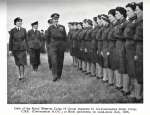 13. ID BOX005_009_P105 Girls of the Royal Observer Corps 18 group inspected by Air-Commodore Finlay Crerar, CBE (Commandant R.O.C.) at Birch aerodrome, on stand-down.
  From ...
Cat1 War-->World War 2 Cat2 Birch-->Events