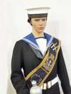 19. ID DIS2019_SCC_003 Mersea Island Sea Cadet with sash and mace.
2019 Summer Exhibition. The Uniform was loaned by the Royal Hospital School, Holbrook.
The Drum Major Sash ...
Cat1 Sea Cadets Cat2 Museum-->Publicity