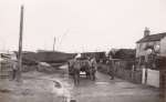  Coast Road, West Mersea after the 1953 Flood. Fred Cutts on right.  IA02_115