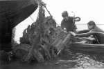  Salvaging an engine from Typhoon R8895 which came down in the Blackwater 22 March 1944.
 The engine is lifted, showing its enormous size.  REG_2005_TYP_003