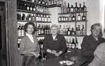 49. ID BJ57_089_015 Opening of Wine Shop, Howard's Stores, Church Road. L-R Bessie Dixon, Wyn Michael-Smith, Mrs White.
Cat1 Mersea-->Shops & Businesses