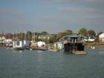 140. ID TM3_1396 Houseboats at West Mersea. L-R SPRAY (2 decks), MULROY ?, No40.
Cat1 Mersea-->Houseboats
