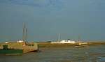 93. ID PBIB_SIM1_008 Tollesbury Creek. Ex landing craft on the left, used by oystermen. Woodrolfe or Woodrope Creek. From a 1950s slide taken by Mary Sime.
Cat1 Tollesbury-->Woodrolfe